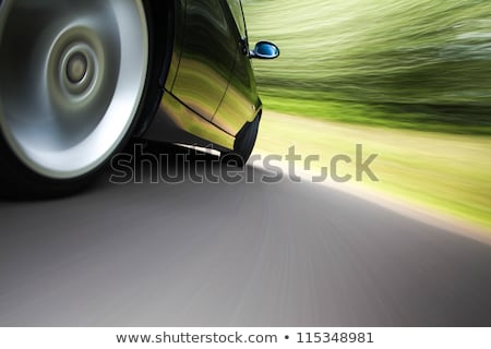 Foto stock: Rear Side View Of A Sport Car In Blurred Motion