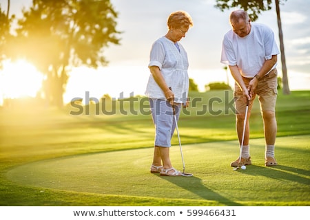 Stockfoto: Senior Couple Playing Golf