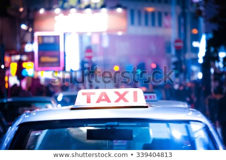 Stockfoto: Abstract Cityscape With Taxi Car At Night City Hong Kong