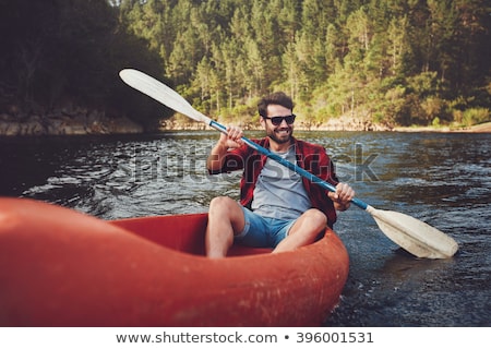 Stok fotoğraf: Young Man Rowing