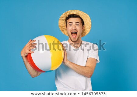 Сток-фото: Attractive Shirtless Young Man Standing On Beach