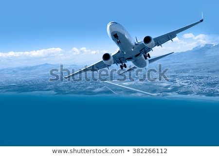 Stockfoto: Passenger Plane In Blue Sky