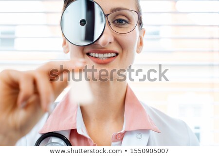 [[stock_photo]]: Ent Specialist Getting Ready For An Examination