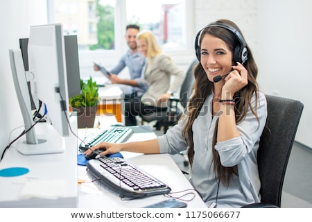 ストックフォト: Young Friendly Female Hotline Operator Of Call Center