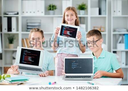 Stock photo: Three Happy Successful Classmates Showing Their Presentations