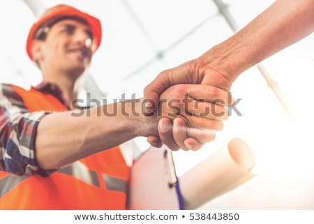 Stock foto: Architect And Engineer Construction Workers Shaking Hands While