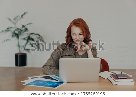 Zdjęcia stock: Busy Woman Freelancer Holds Spectacles For Vision Correction Poses At Home Desktop Has Paperwork A