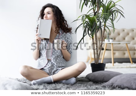 Stock photo: Woman Wearing Socks And Underwear Sitting On Sofa