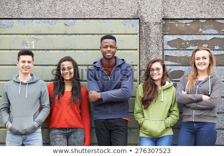 Stockfoto: Gang Of Teenagers Hanging Out In Urban Environment