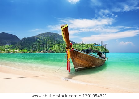 [[stock_photo]]: Thai Traditional Wooden Boat At Ocean Shore Thailand