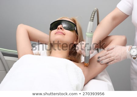 Zdjęcia stock: Woman Having Underarm Laser Hair Removal Treatment