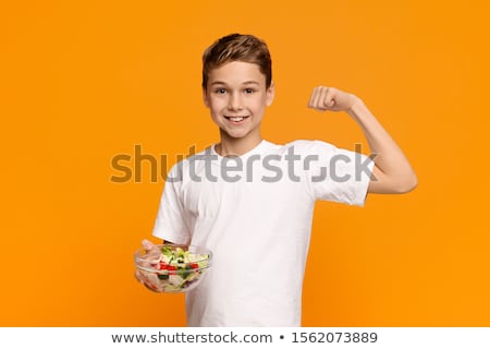 Сток-фото: Cute Teen Boy Eating Salad