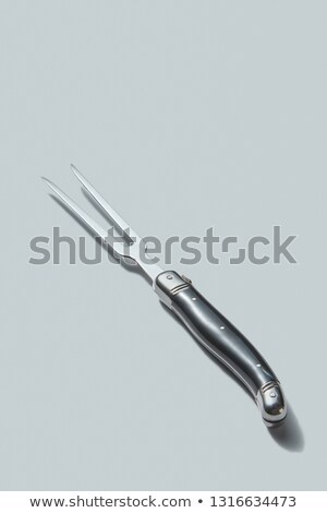 Stok fotoğraf: Kitchen Retro Meat Fork From Steel With Shadows On A White Background Copy Space