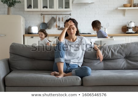 Zdjęcia stock: Naughty Girl Playing With Her Tired Mother