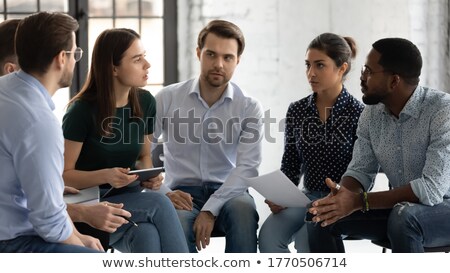 Foto stock: Confident African Businessman Explaining Working Moments