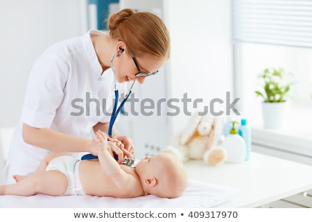 Stock photo: Doctor Or Pediatrician With Baby Patient At Clinic