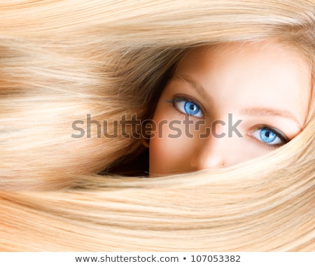 Foto stock: Beautiful Blond Woman With Blue Eyes