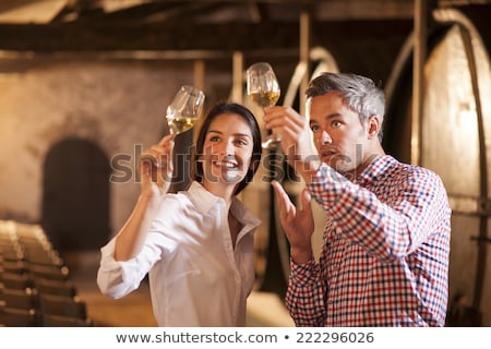 Foto stock: Couple In A Wine Cellar