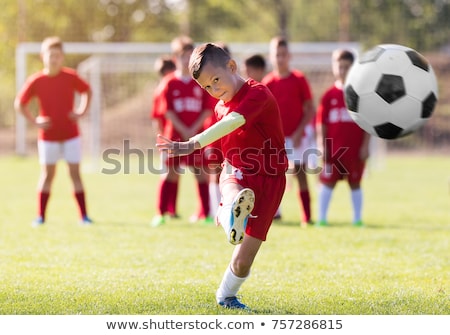 Stock photo: Child Soccer Player Playing Football