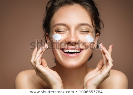 Stock photo: Beautiful Young Woman Face With Applying Natural Beauty Make Up