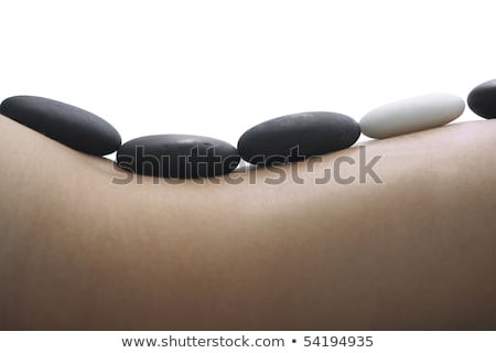 Foto stock: Massage With Hot Volcanic Stones