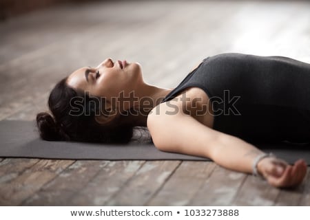 Foto d'archivio: Woman Resting On The Floor