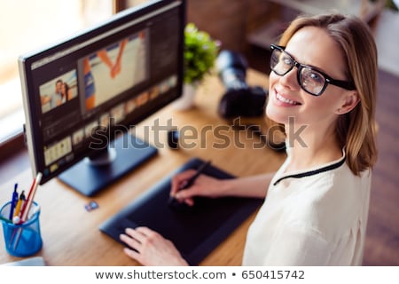 Stockfoto: Desktop Of Young Woman Photographer Working With Laptop