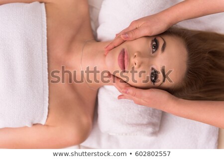 Stockfoto: Attractive Young Woman Receiving Head Massage At Spa Center