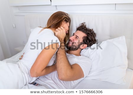 Stockfoto: Young Passionate Couple In Bed