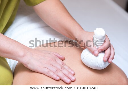 Stock foto: Woman Getting Thai Herbal Compress Massage In Spa