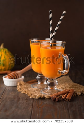 Zdjęcia stock: Healthy Carrot Smoothie With Orange And Cinnamon In Glass