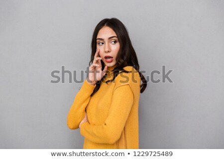 Foto stock: Image Of Caucasian Woman 30s With Long Dark Hair Looking Aside