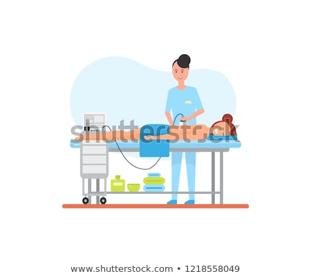 Foto stock: Massage Treatment Using Apparatus Machine Vector