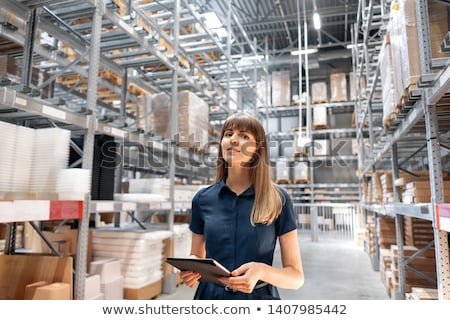 Stok fotoğraf: Pretty Warehouse Manager Checking The Inventory