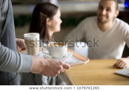Stock photo: Waiter Serving Clients Carrying Tray With Order