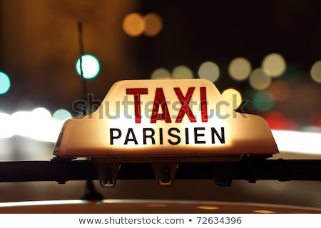 Stock foto: Paris Taxi By The Arc De Triomphe