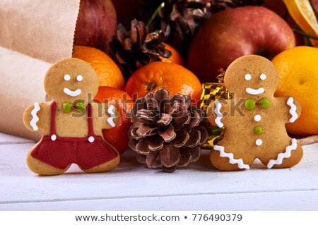 Stock fotó: Cute Boy With A Large Cookie Biscuit