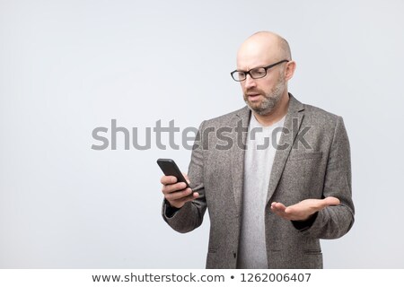 Grouchy Man Reading An Email Foto stock © Koldunov