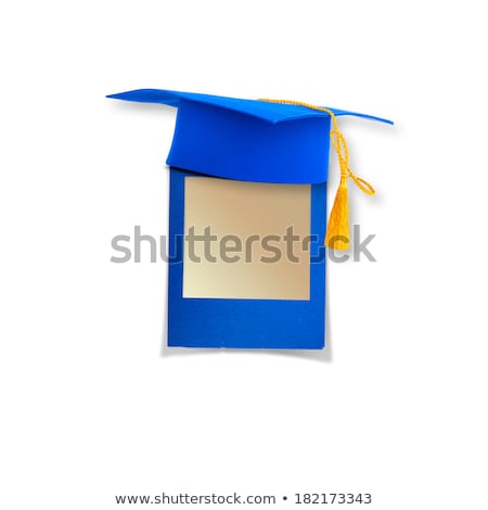 Сток-фото: Mortar Board Or Graduation Cap With Blue Slide On The Background