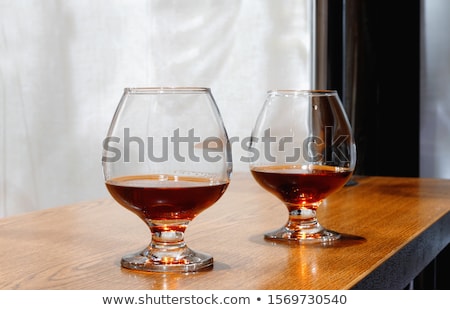 Stock photo: Two Goblets Of Brandy On Wooden Old Counter Top