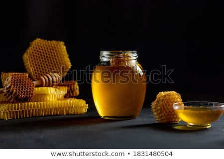 Stok fotoğraf: Jars Of Honey And Honeycomb Honey Products