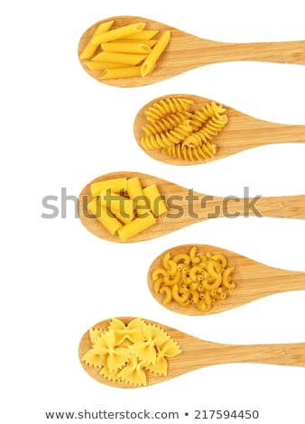 Foto d'archivio: Raw Pasta In Spoon Closeup