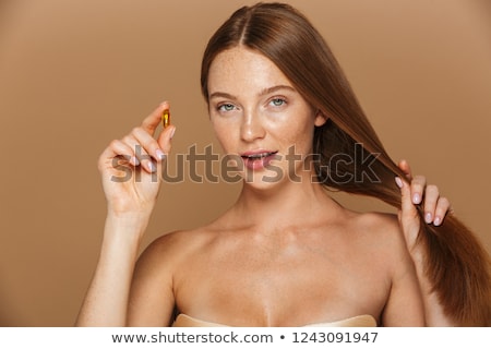 Foto stock: Portrait Of A Happy Young Topless Woman