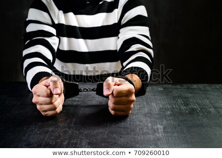 Zdjęcia stock: Criminal In Handcuffs Asking For Freedom