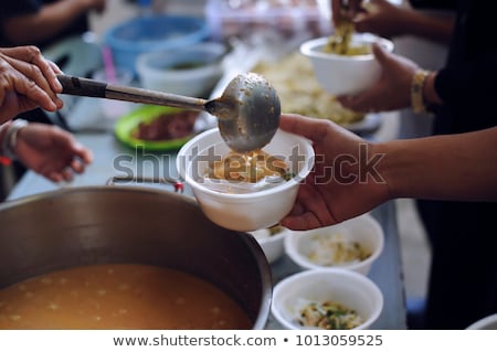 Foto stock: Feeding The Poor