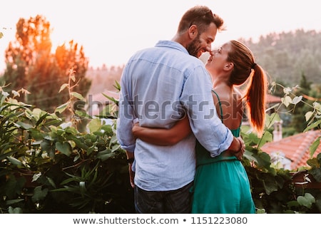 Сток-фото: Attractive Couple On Balcony