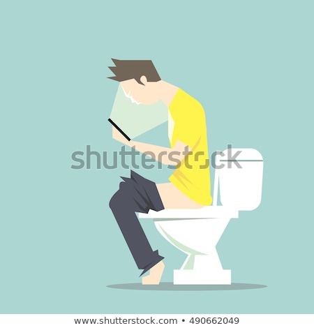 Stock foto: Young Man Using His Smartphone In The Toilet