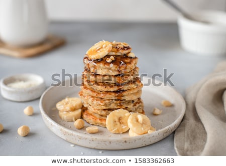 ストックフォト: Pancakes With Walnuts Dates And Date Syrup