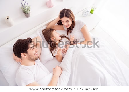 Foto stock: Couple Sleeping On Bed With Blanket