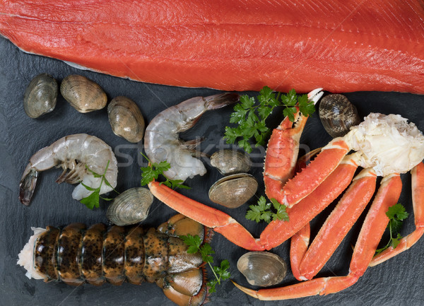 Freshly prepared seafood on natural slate rock   Stock photo © tab62